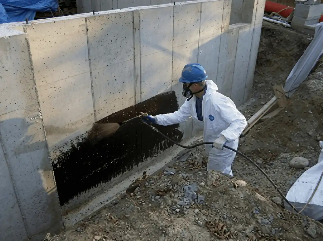 Professional waterproofing the exterior walls of the basement in Hialeah, FL