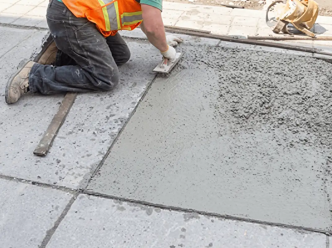 Professional repairing a concrete floor in Hialeah, FL
